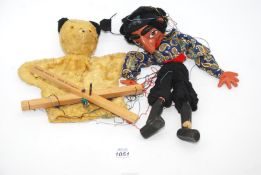 A Sooty hand puppet together with a S.M. pirate Pelham puppet.