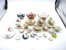 A quantity of small items including nursery cup and saucer, dolls part tea set, souvenir Tyg, etc.
