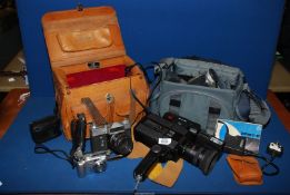 A quantity of cameras and camcorders, etc including a Zenit-e film camera, Rankaldis ES10 flash,
