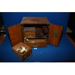 A novelty Oak smoker's Cabinet most uncommonly in the form of a security safe having a pair of