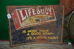 A contemporary distressed tin Lifebouy Soap sign, a/f,