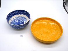 A West German shallow Bowl in mottled rich yellow and a Wedgwood 'Ferrara' bowl.