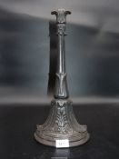 An antique (Edwardian?) cast iron doorstop of classical form decorated with acanthus,