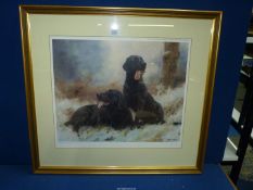 A framed and mounted John Trickett limited edition Print no 233/850 depicting two black Labradors,