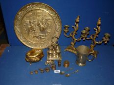 A quantity of brass including a pair of candlesticks, tankard, charger, jewellery casket, etc.