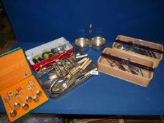 A quantity of mixed cutlery including a boxed escargot cutlery set, sweetcorn holders,