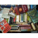 A box of books to include Heraldry, Orcop by Delphine Coleman, David Baldacci,