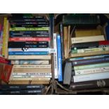 Two small boxes of books to include Sudoku books, Medical Dictionary,