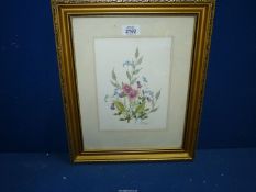 A framed and mounted watercolour depicting a Still Life of Flowers, signed Christine Coleman.