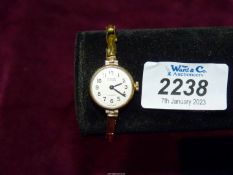 An Avia 17 jewel 9ct gold ladies wristwatch.