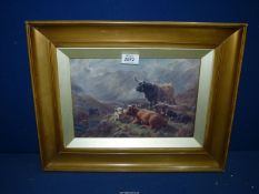 A framed print depicting Highland Cattle in the Scottish mountains, no visible signature.