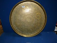 A large brass Benares Tray with scenes of figures and animals, 23 1/2'' diameter.