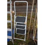 A metal 3 rung stepladder.