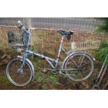 A Daws Kingpin folding bicycle, 3 speed, with shopping basket x 2.