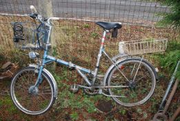 A Daws Kingpin folding bicycle, 3 speed, with shopping basket x 2.