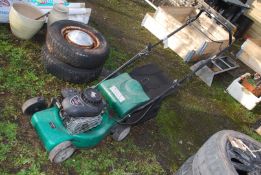 A Qualcast 450 self propelled mower with grass box, 148 cc engine, good compression.
