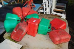 Fuel cans; 7 red, 4 green.