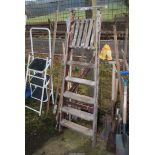 A 6 rung wooden stepladder.