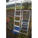 An aluminium 6 rung stepladder with double extender.