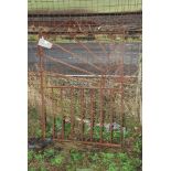 A heavy duty wrought iron garden gate, 31" wide x 45" high.