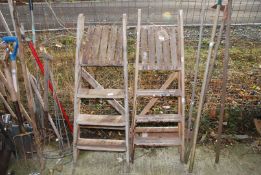 Two pairs of 3 rung wooden stepladders.