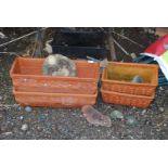 Two pairs of terracotta planters plus various animals.