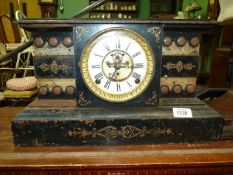 A metal cased Mantle Clock being of the appearance of a marble clock, 17'' long x 10'' high, a/f.
