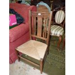 An Oak side Chair having woven seagrass seat.