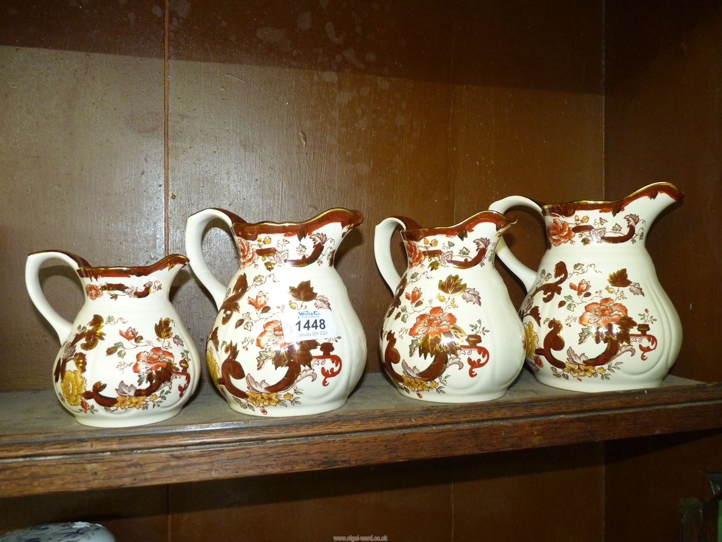 Four graduated Masons Brown Velvet jugs with round bases.