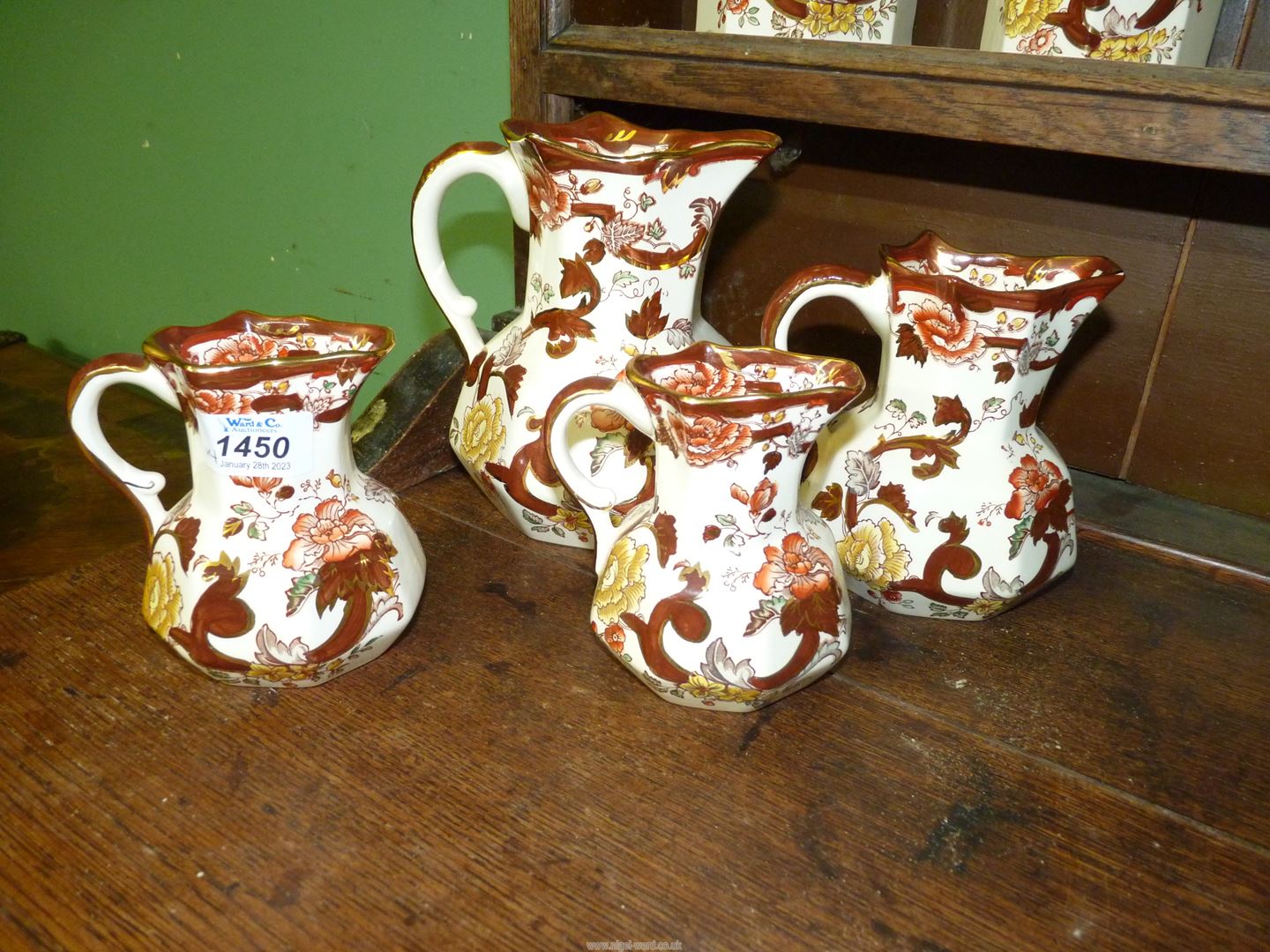 A set of four graduated Masons Brown Velvet jugs with octagonal bases.