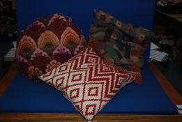 Three cushions including tapestry, etc.