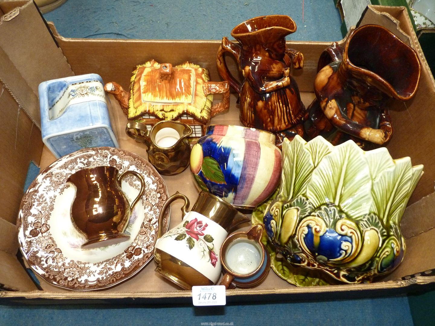 A quantity of china to include lustre jugs, jardiniere with stand, Palissy 'Game Series' bowl,