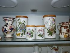 Four Portmeirion Botanical Garden canisters with lids; two large and two small.