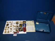 A quantity of Military buttons, badges and cloth badges, to include,