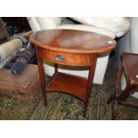 An oval Mahogany Occasional Table,