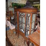 A geometrically glazed Edwardian design China Display Cabinet standing on tapering square legs