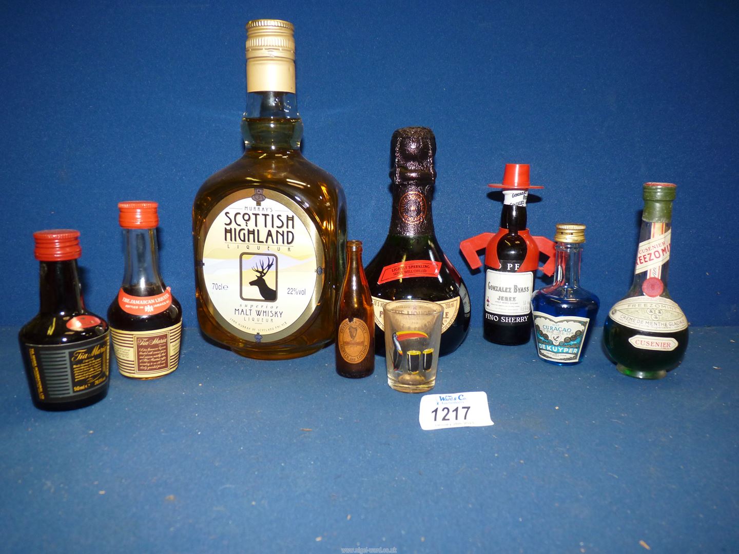 A bottle of Scottish Malt Whisky (70cl) and petite bottle of Liquorelle,