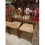 A pair of atractive inlaid bedroom Chairs with caned seats.