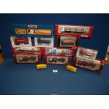 A quantity of boxed model vehicles including Bedford Bus, Matchbox Express truck, etc.
