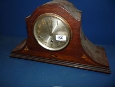 A Napoleon hat shaped Mahogany Mantel clock, some marquetry missing, no key or pendulum present,