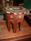 An eastern octagonal Occasional Table having bone and ebonised inlays,