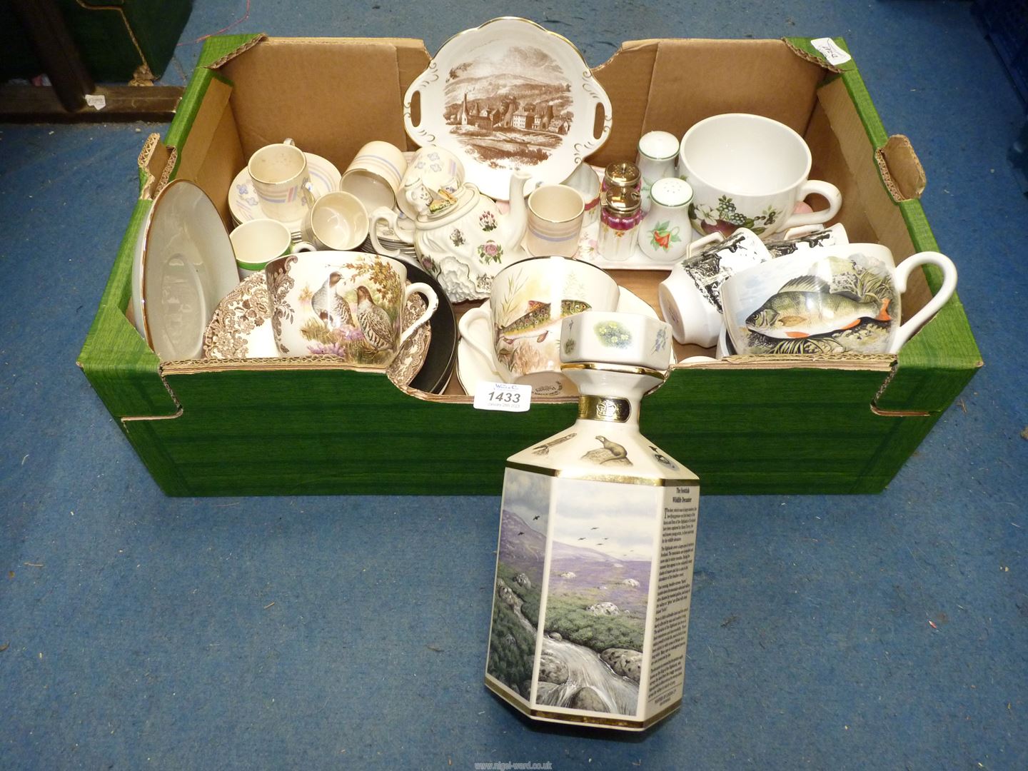 A quantity of china to include two large Portmeirion cups and miniature teapot,