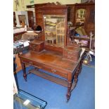 A (matching the previous lot) Walnut & Mahogany dressing table with a bevelled swing mirror the