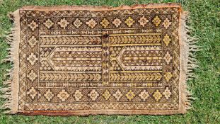 A faded natural dyed terracotta ground Islamic prayer rug, a/f., approx. 16 1/2" x 26".