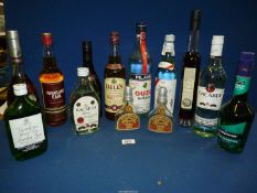 A quantity of bottles of spirits including Bells whisky, Highland Earl whisky, Liberte rum, Bacardi,