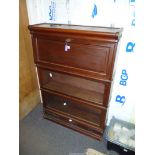 A Globe Wernicke type Mahogany bookcase having an upper bureau section with pigeon holes,