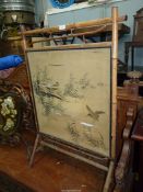 A Chinoiserie Bamboo framed firescreen,