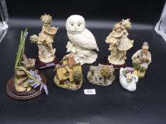 A quantity of ornaments including Lilliput Lane, Country Artist 'Wren with bluebells', owl figure,