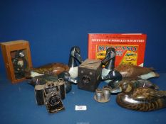 A quantity of miscellanea including wooden ducks, Nagel Vollenda film camera, Hawkeye-Major camera,