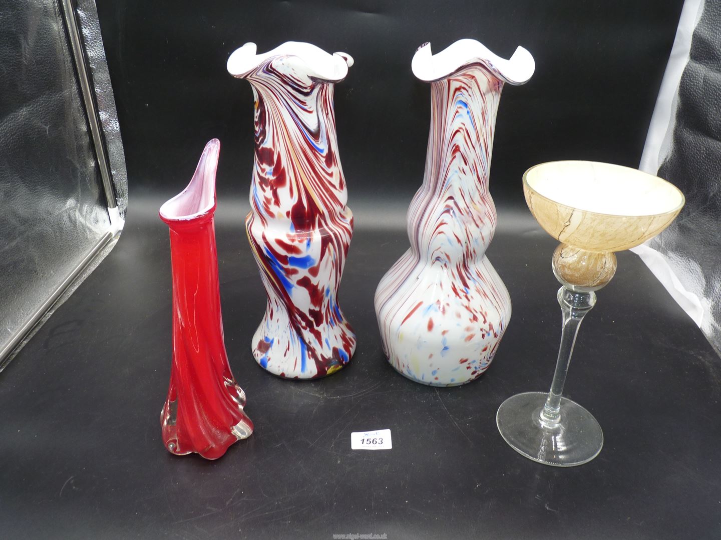 A small quantity of coloured glass, including, two large End of Day vases,